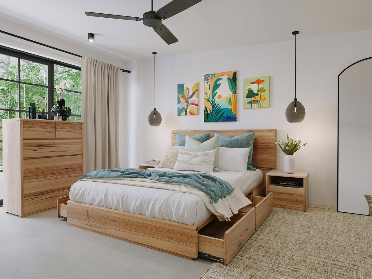 Timber storage bed with drawers in a bright bedroom
